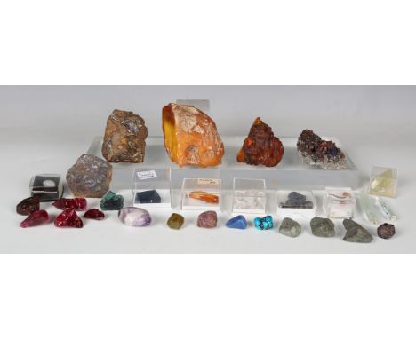 A selection of mineral specimens, including amber, topaz, opal and chalcopyrite on dolomite, length of largest 8.5cm. Provena