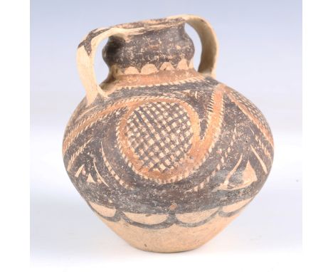 A Chinese Neolithic pottery bird jar, probably Majiayao culture, Banshan phase, circa 2650-2350 BC, the globular body decorat