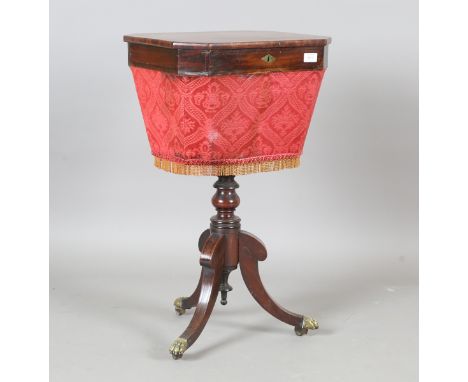 A Regency mahogany rectangular work/sewing table, the rectangular top with canted corners, the hinged lid revealing a fitted 