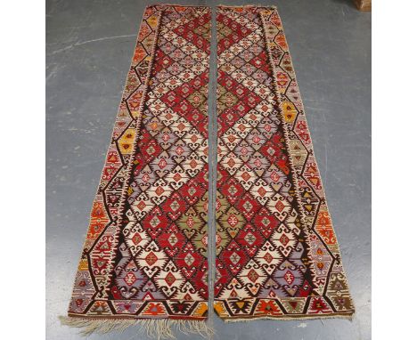A pair of kelhim runners made to be joined at their centres, early 20th century, the charcoal field filled with overall polyc