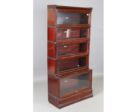 An early 20th century mahogany Globe Wernicke five-tier bookcase with glazed doors, on a plinth base, height 182cm, width 86c