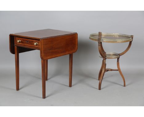 An Edwardian mahogany circular two-tier occasional table by James Shoolbred &amp; Co, with applied brass galleries, height 66