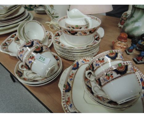 A Dorrick China 'Regal' part tea service in black additional in royal blue