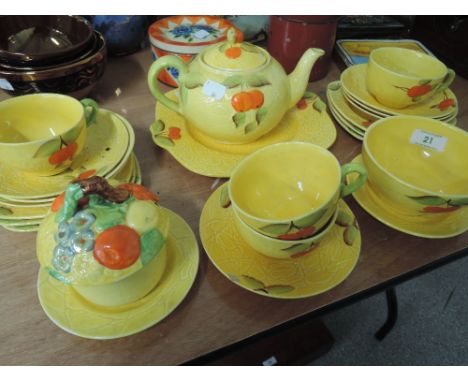 A mid 20th century part tea service in the Carlton Ware style