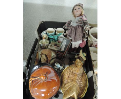 A miscellaneous box including ceramic headed doll, figurines, egg crock etc