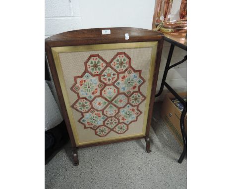 A Victorian mahogany framed, tapestry fire screen