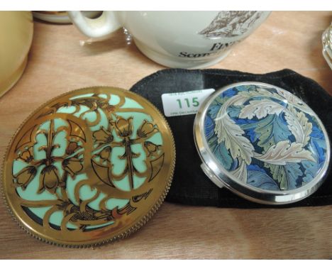 A Stratton Engine tooled enamelled compact with oak leaf design and a pierced metal design compact