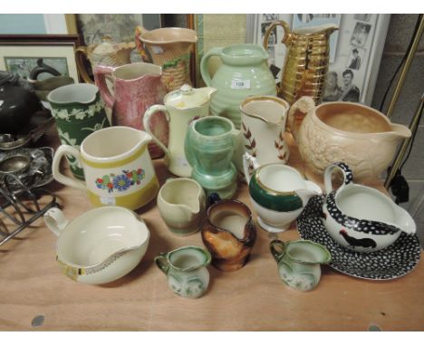 A selection of jugs including Denby, Govancraft, Crown Devon, Susie Cooper etc