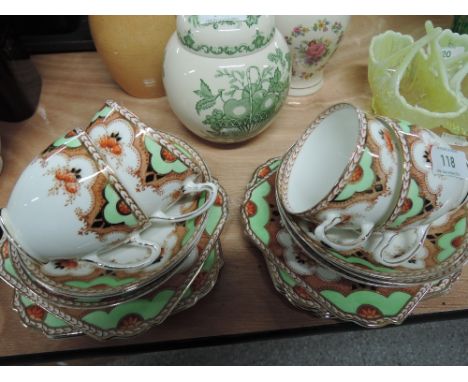 A Taylor & Kent gilt and floral part tea service