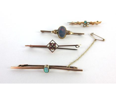 A 9ct yellow gold bar brooch set oval opal and three further 9ct yellow gold bar brooches (4)   CONDITION REPORT:  Opal with 