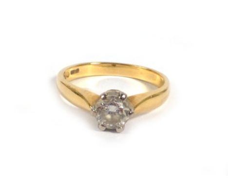 An 18ct yellow gold ring set single brilliant cut diamonds in a six claw setting, stone approximately 0.5 carats, ring size K