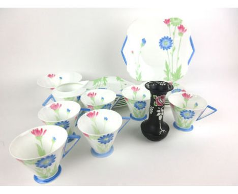A Shelley six sitting tea service decorated in the 'Daisies' pattern, in the 'Eve' shape, numbered 11985   CONDITION REPORT: 