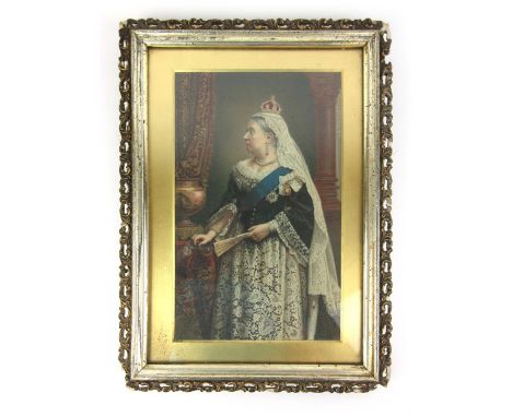 A possible 19th century framed and glazed silk of Queen Victoria, near full portrait holding a fan wearing the crown of India