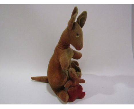 An early-mid 20th Century Steiff style soft filled corded velvet kangaroo and joey with stitched eyes, approximately 32cm tal