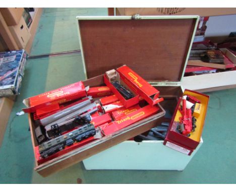 A wooden trunk containing a collection of Tri-ang and other 00 gauge locomotives, rolling stock, track etc including R351 EM2