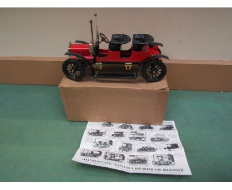 A Jan Blenken Maxitoys pressed tin model of a vintage car, 32cm long 