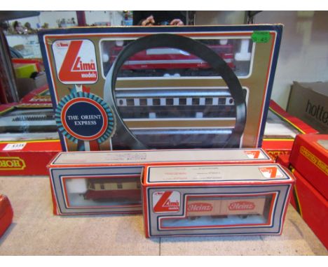 A boxed Lima Golden Series H0/00 gauge set 10 9703 "The Orient Express" together with 205133 rail car and 30 3545 "Heinz" wag
