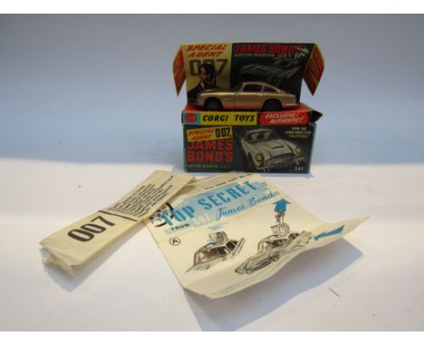 A boxed diecast Corgi 261 James Bond's Aston Martin with secret instructions and two figures