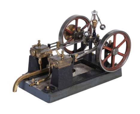  An early model of a twin simple horizontal live steam mill engine,   the brass cylinders with oiler cups, eccentric driven s