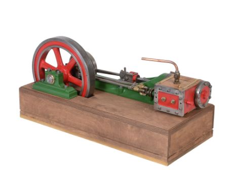  A model of a live steam horizontal mill engine,   the single cylinder 2 1/4" bore by 4 1/2" stroke lagged in simulated woode