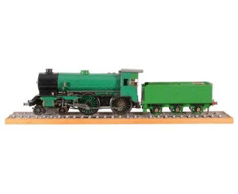  A model of a 2 1/2 inch gauge live steam 4-4-0 tender locomotive,   the boiler with fittings including sight-glass, regulato