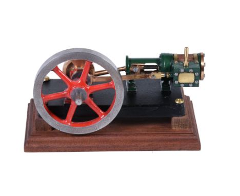  A model of a horizontal live steam mill engine,   having single cylinder lagged in wood with brass strapping, steam inlet an