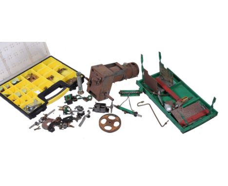  A dismantled model of a Freelance traction engine,   metal boiler, sundry parts. Model incomplete. Boiler length 30cm. 