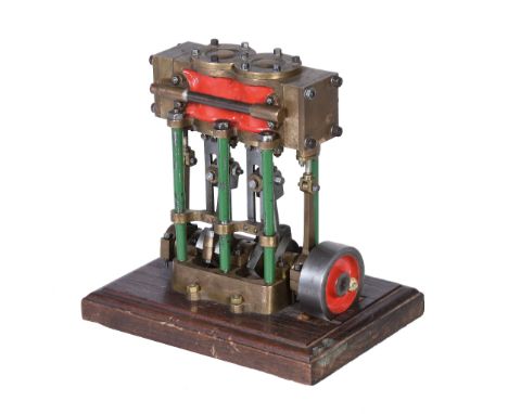  A well engineered model of a live steam vertical twin simple marine launch engine,   the open crank with eccentric driven st