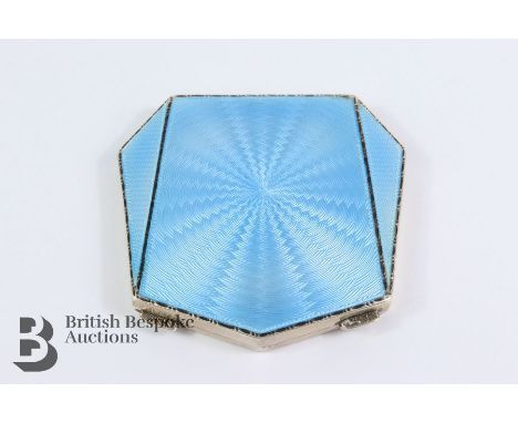 Solid silver and blue enamel compact, Birmingham hallmark, dated 1934, mm Adie Bros, approx 75 x 75mm, approx 102.5 gms.&nbsp