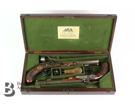 Cased pair of John Manton target pistols, 19th century, each signed in gold along the top flat 'Manton London'. Breeches each