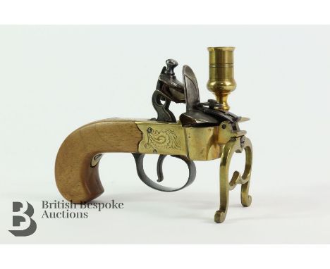 Reproduction flintlock tinder lighter, have a brass frame and boxwood stock. Note: Collection of a gentleman one of the first