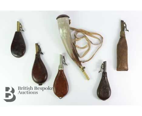 Five assorted leather shot flasks, including a replica German cows horn flask. Note: Collection of a gentleman one of the fir