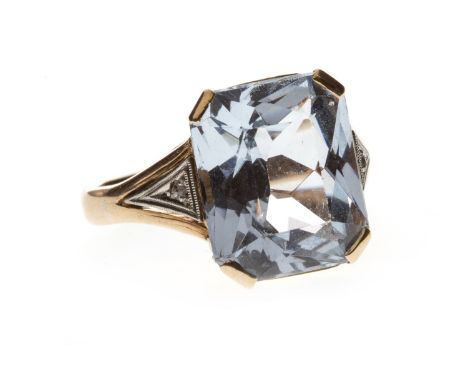 ART DECO AQUAMARINE AND DIAMOND RING, set with a rectangular faceted aquamarine 11.8mm long, on rose cut diamond shoulders, m