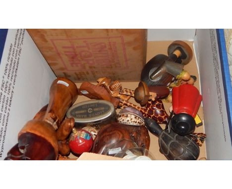 Assorted carved wooden items, seashells, a vintage baby's musical box, an original boxed Smith's vintage bakelite wall clock 