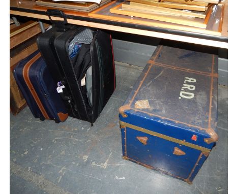 Blue metal-bound trunk and two modern suitcases (3) 