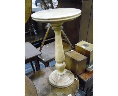 Mahogany circular occasional table on tripod support and a lightwood circular jardiniere stand (2) 