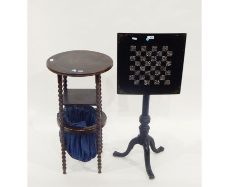 Victorian lacquered tilt-top games table, the square top with inlaid mother-of-pearl games board over a turned stem on tripod