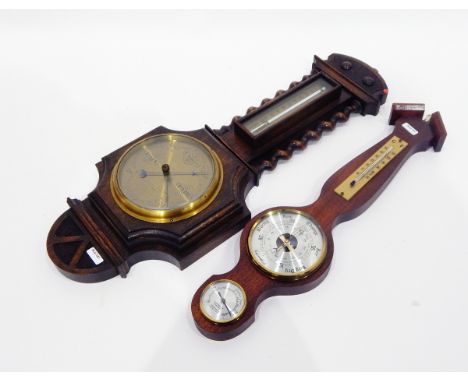 Aneroid barometer by Crouch of Cardiff and Newport, in oak case, another barometer, a child's painted tin sewing machine, pai