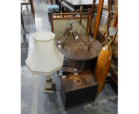 Small circular wooden side table, a wood-framed firescreen, two table lamps, a small wooden cupboard, a small rug and an iron