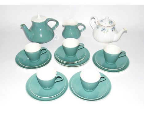 Poole pottery part tea service with green ground, a Gainsborough china teapot, floral decorated and Booths 'Real Old Willow' 