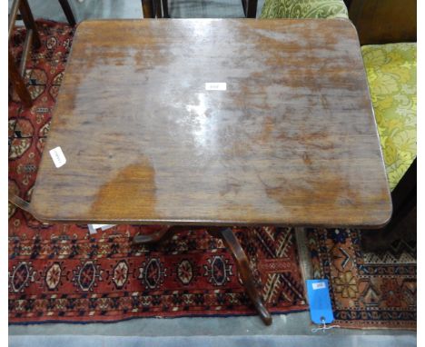 Rectangular mahogany tilt-top table on turned pedestal and tripod supports 