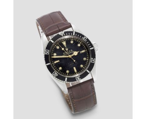 Rolex. A fine and rare stainless steel automatic wristwatch with gilt 4 line dial and big crownModel: Submariner '4 Line'Refe