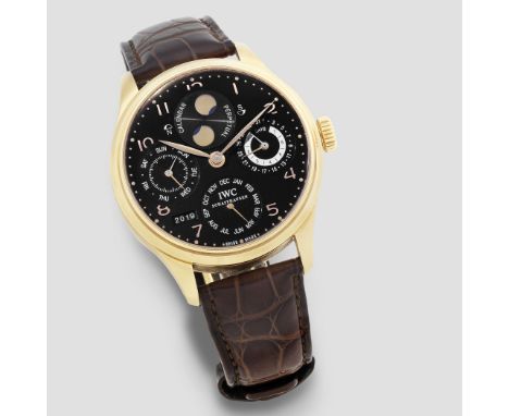 IWC. A fine 18K rose gold automatic perpetual calendar wristwatch with moon phase and 7 day power reserveModel: Portuguese Pe