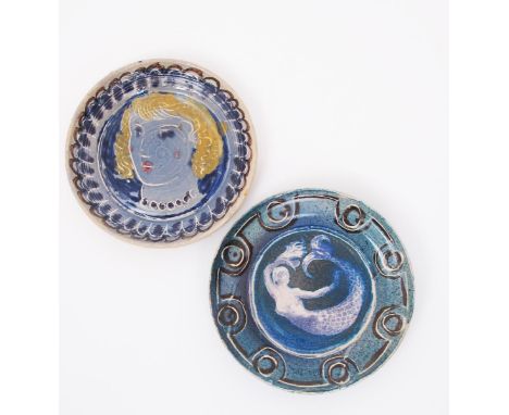 Quentin Bell (1910-1996) a Fulham Pottery plate painted with a female portrait, in shades of blue, yellow and aubergine, and 