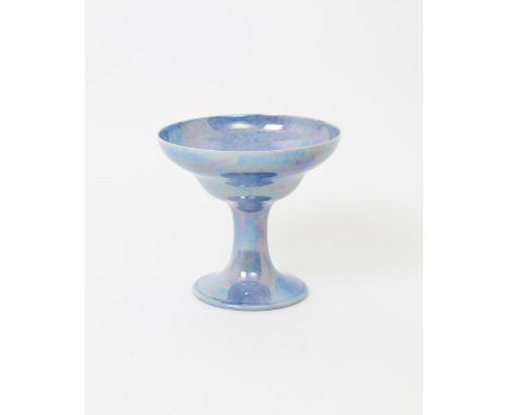 A Ruskin Pottery tazza William Howson Taylor,  dated 1923, covered in a streaked blue lustre glaze impressed factory marks an