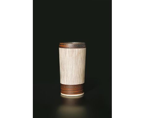 ‡ Dame Lucie Rie DBE(1902-1995) a porcelain beaker vase, flaring form with manganese sgraffito lines and manganese bands impr