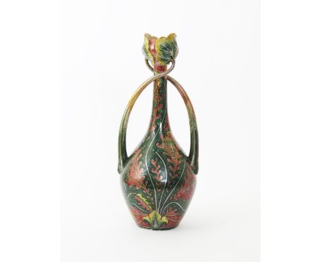 A tall Art Nouveau Cantagalli lustre vase,  ovoid body with knopped cylindrical neck, flanked with sinuous foliate stem handl