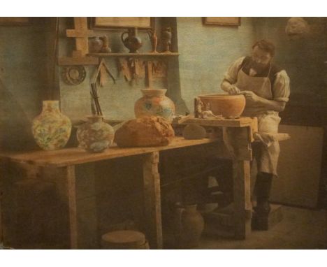 The Potter a Martin Brothers portrait colour photograph on artist board of Walter Martin, modelled throwing a large pot in th