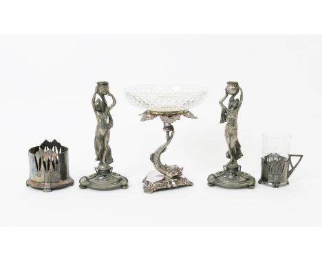 A pair of W.M.F electroplated metal candlesticks,  each modelled as an Art Nouveau maiden, offering up a large urn sconce and