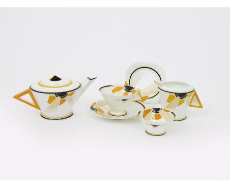 A rare Shelley Sunray Vogue tea set for one, painted in shades of yellow and black, comprising; tea pot and cover, milk-jug a